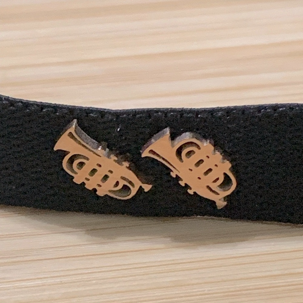 Adorable little trumpet stud earrings